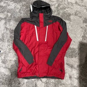 North face boys size large windbreaker in red and grey